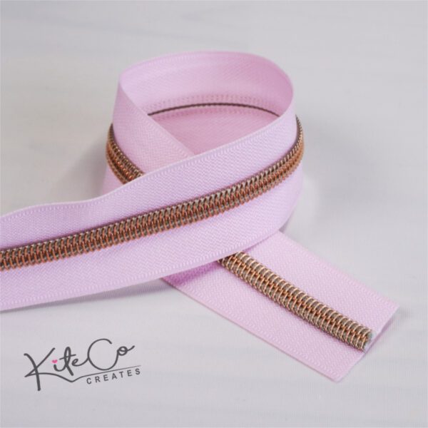 Pink and rose gold zipper